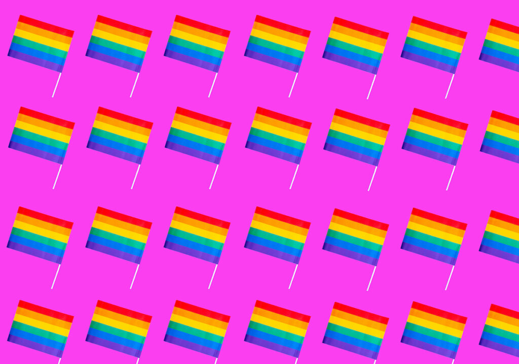 rainbow-flags-on-pink-background
